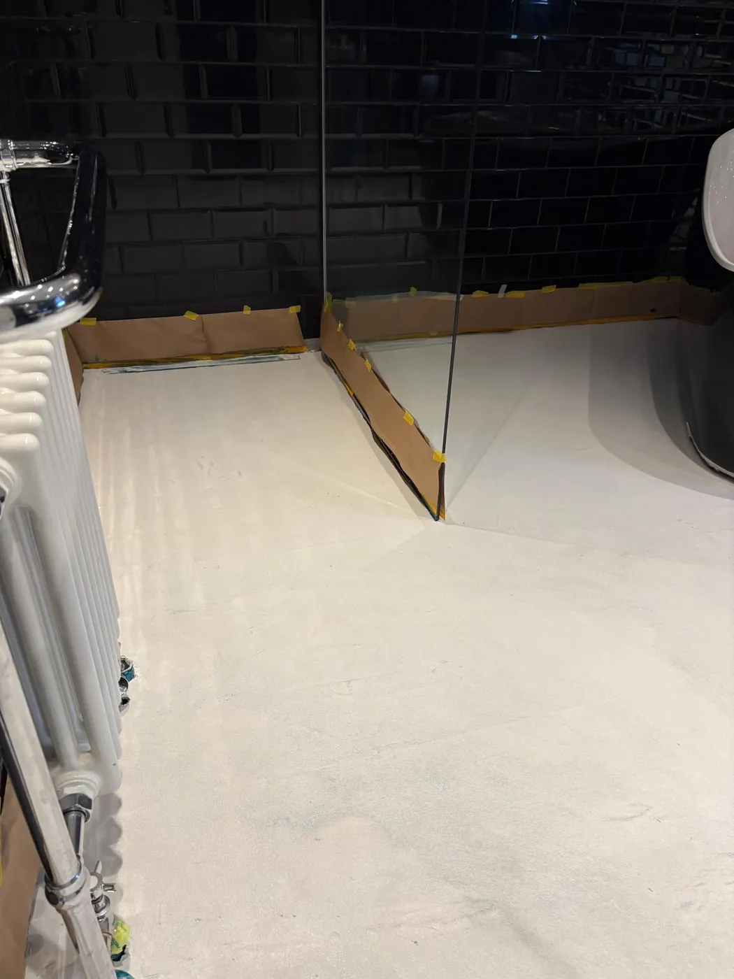 Microcement bathroom floor being applied by Glasgow Microcement (photo 9)