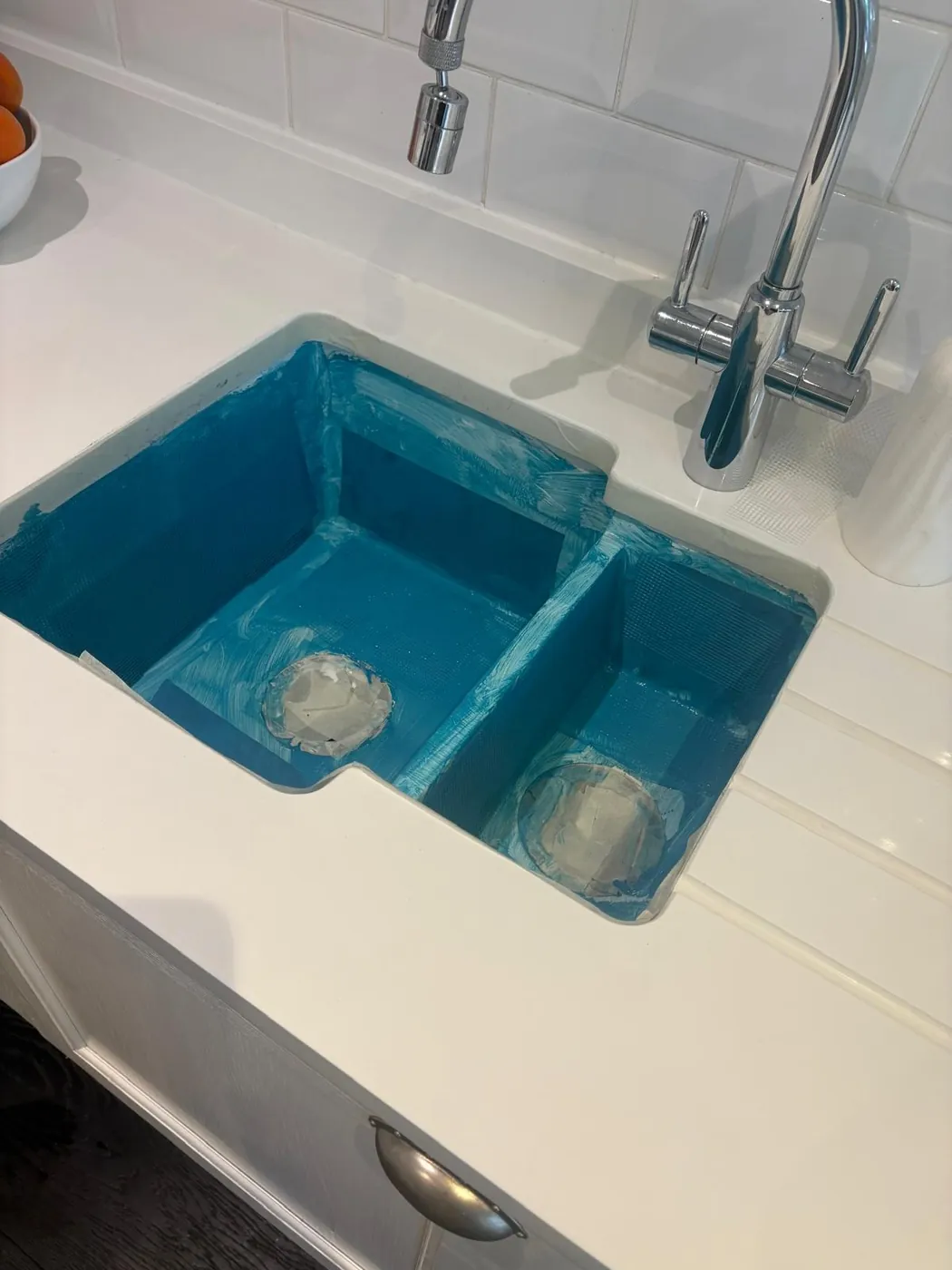 Microcement kitchen sink being applied by Glasgow Microcement (photo 1)