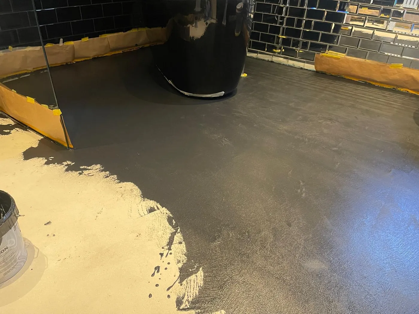 Microcement bathroom floor being applied by Glasgow Microcement (photo 7)