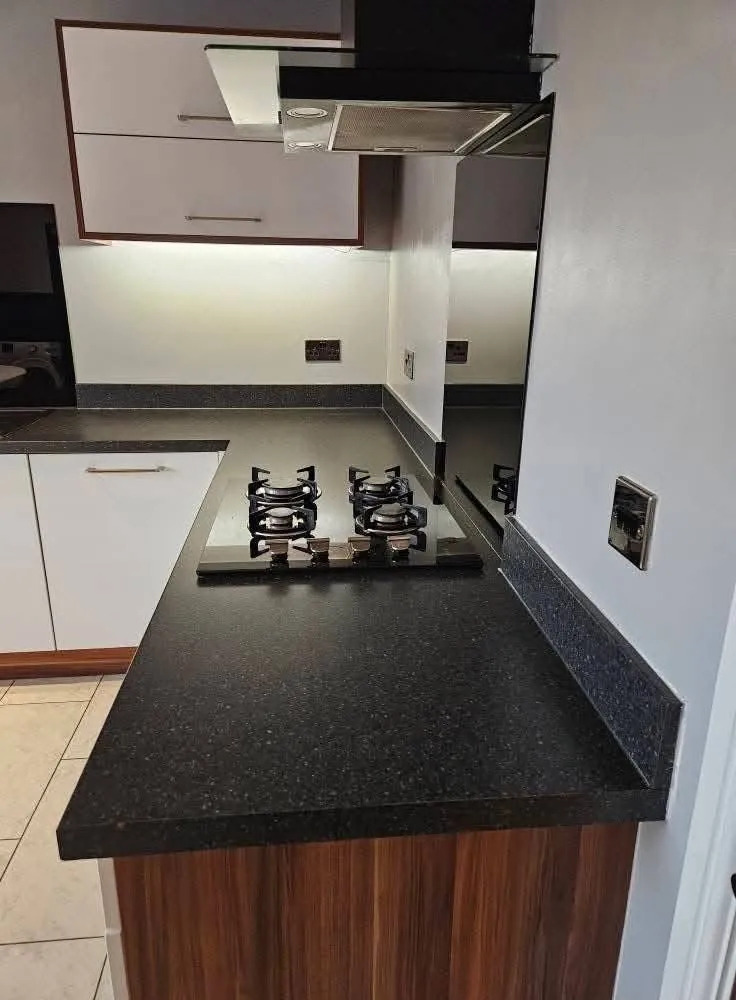 Spray granite worktop before refurbishment by Glasgow Microcement (photo 5)